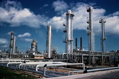 Workers oversee operations at Ghana’s Tema Oil Refinery as it resumes fuel processing after a six-year shutdown.