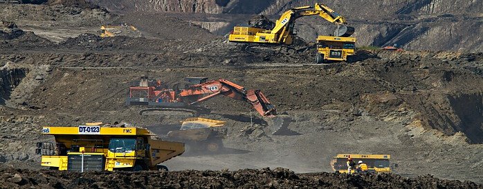 Heavy mining equipment operating at an open-pit mine in Liberia as the country seeks to expand mining output and boost national revenue