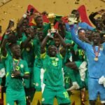Senegal players celebrate after winning the AFCON final against Morocco in Rabat