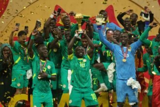Senegal players celebrate after winning the AFCON final against Morocco in Rabat