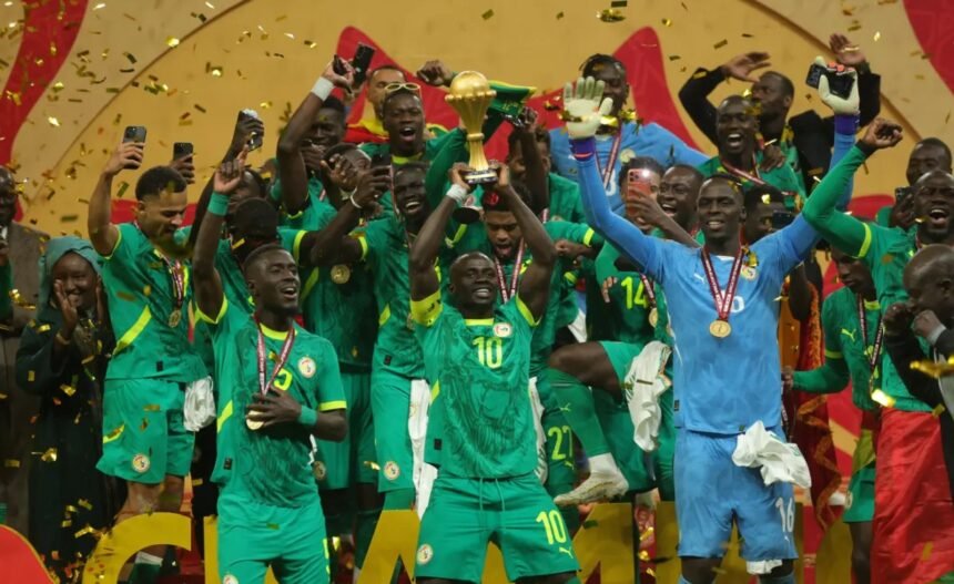 Senegal players celebrate after winning the AFCON final against Morocco in Rabat