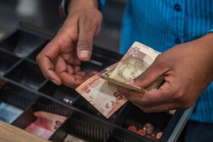 Finance Minister Enoch Godongwana reviewing South Africa's fiscal strategy as debt stabilises and the economy shows signs of recovery.