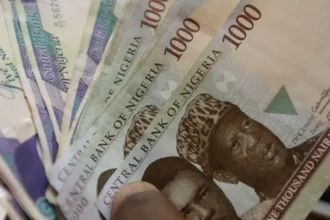 Currency exchange rate board showing African currencies fluctuating against the U.S. dollar amid market pressure