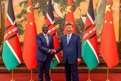 Kenyan President William Ruto and Chinese President Xi Jinping shaking hands with Chinese and Kenyan flags, symbolizing Kenya-China trade agreement and export growth