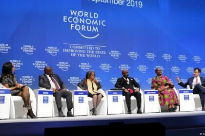 Delegates at the World Economic Forum Africa Summit 2027 discussing business and investment opportunities in Johannesburg or Cape Town.