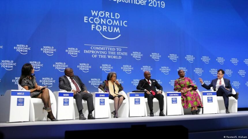 Delegates at the World Economic Forum Africa Summit 2027 discussing business and investment opportunities in Johannesburg or Cape Town.
